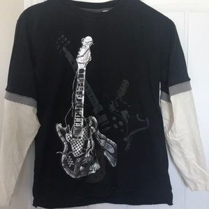 A retro silver and black Guitar T shirt
